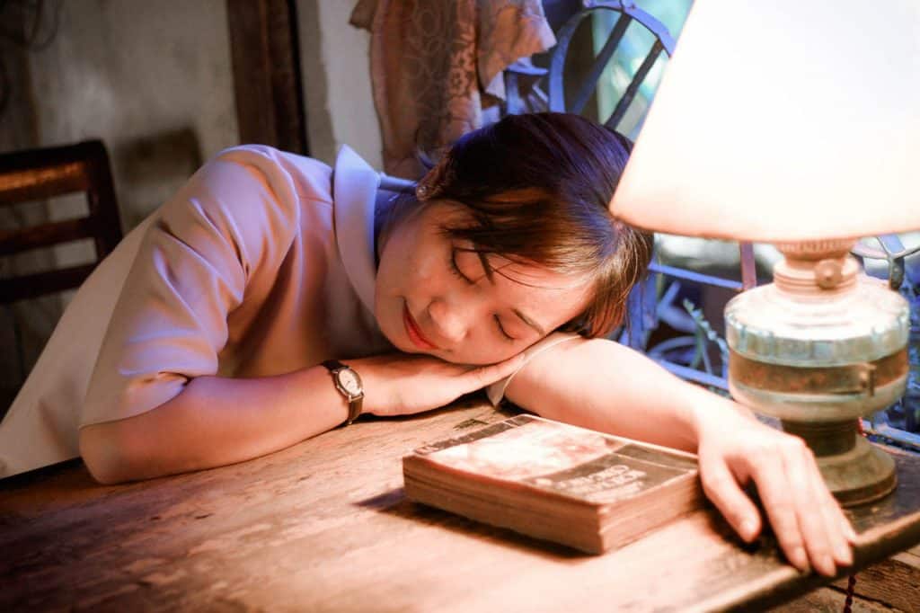 woman asleep while reading