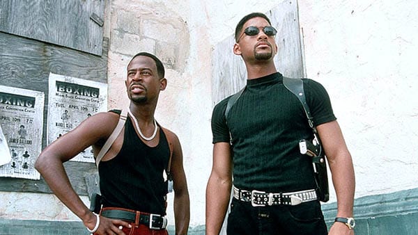 Bad Boys - Will Smith and Martin Lawrence look stylish in all black while surveying the streets - best buddy cop movies ever