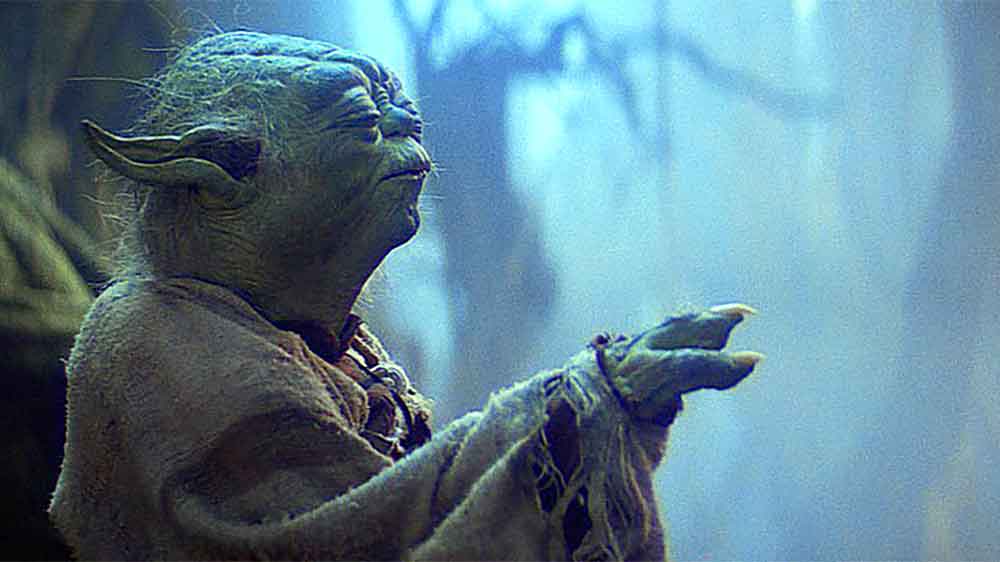 Yoda lifts the X-wing from the Dagobah swamp with maximum Force concentration