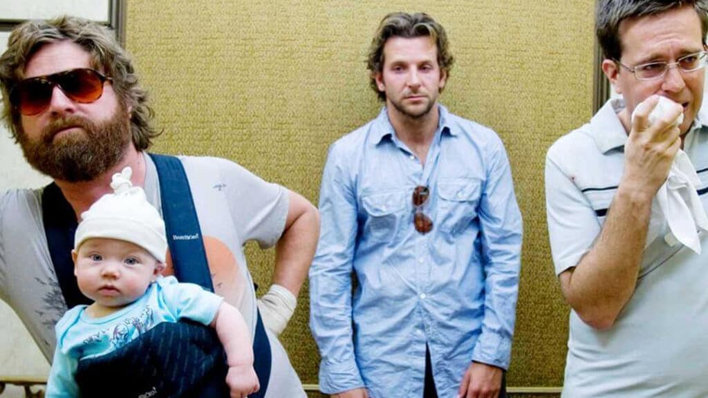 Screen capture from The Hangover, a comedy often cited among movies that aged badly, featuring the main characters standing together in Las Vegas, visibly disheveled and confused.