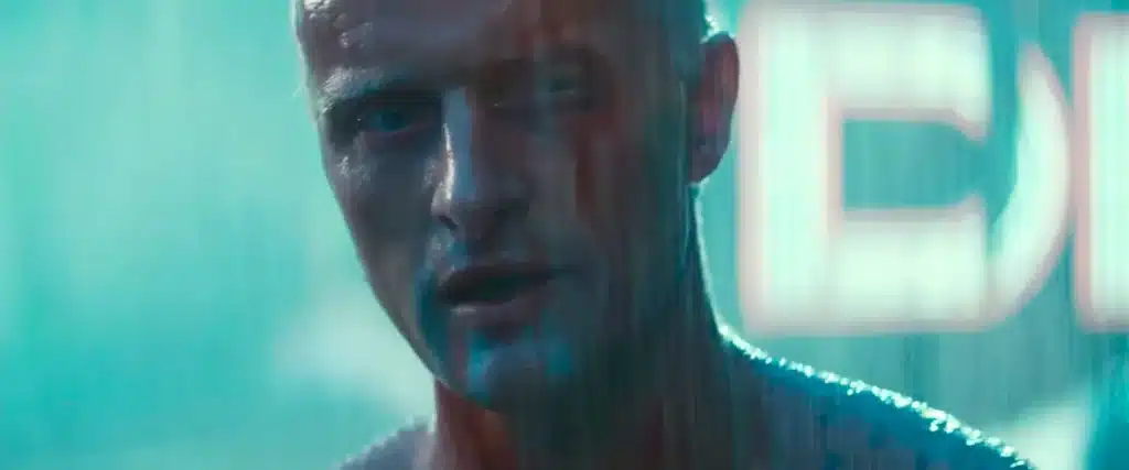 Roy Batty from Blade Runner in a dark futuristic setting. Still image from the tears in rain monologue. A great example of how a "No Doom" outcome of p(doom) or AI Doom can still be negative or dystopic.